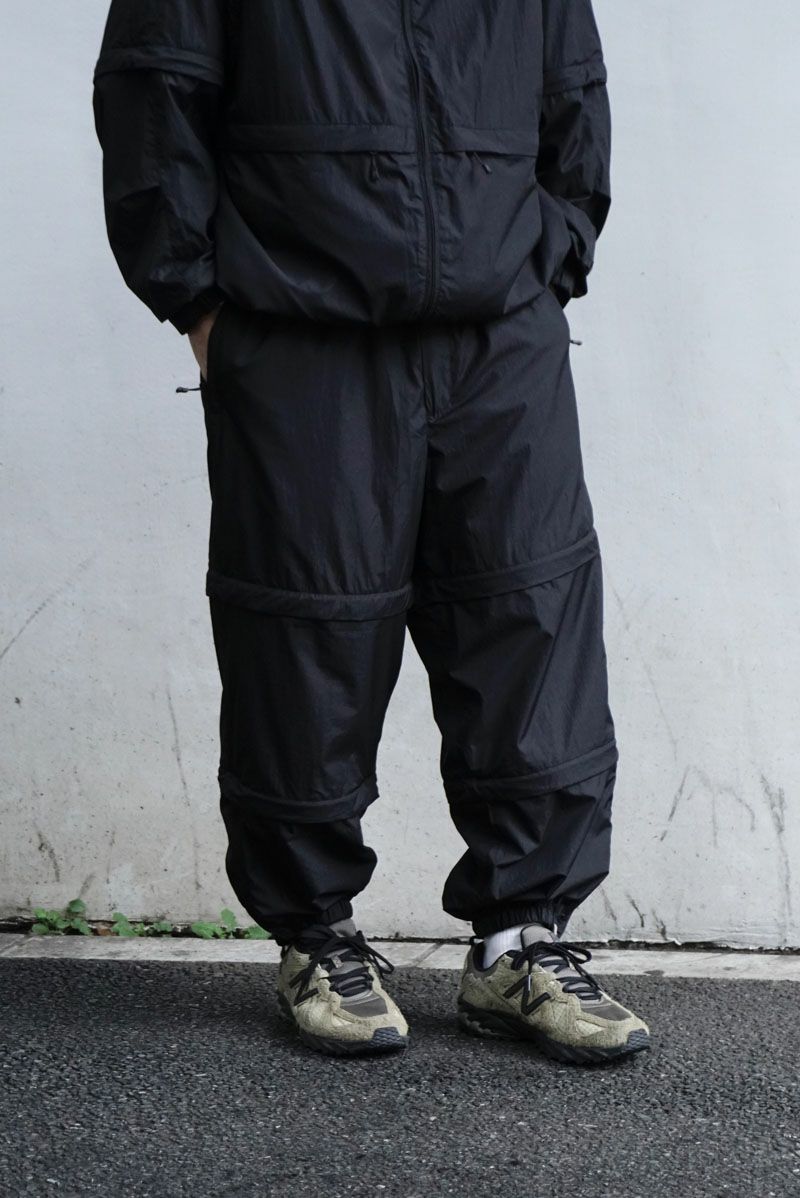 【MENS】TECH DECHATABLE WINDBREAKER PANTS[BLACK] | 1LDK ONLINE STORE